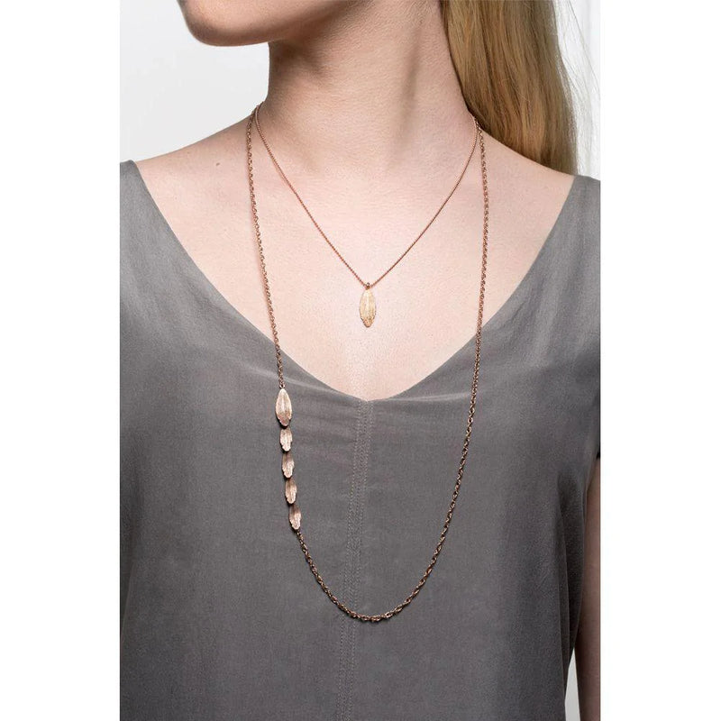 Gold 2025 raven pendant